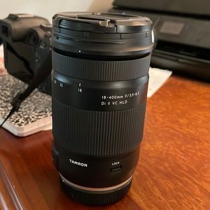 Like new, in the box Tamron 18-400mm lens.